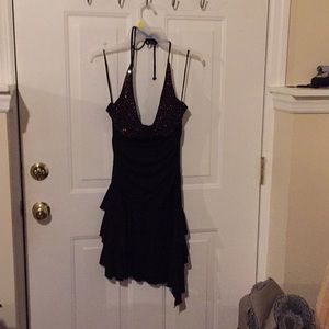 Black dress with red and white studs on top